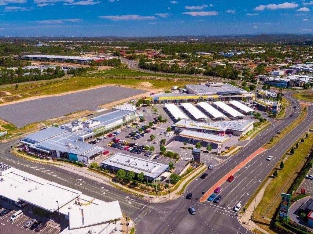 Aerial view of Coomera Square, a modern open-style essential retail located in Coomera's main retail trade precinct.