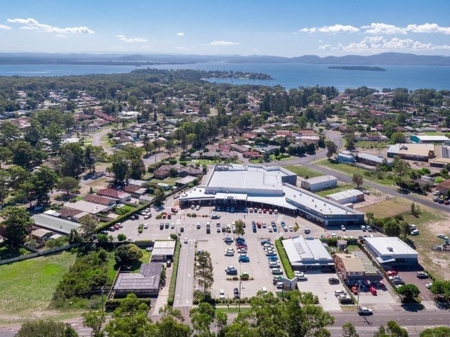 A modern and spacious single-story shopping center located in Tanilba Bay with a total area of 3,841 sqm, managed under REIT